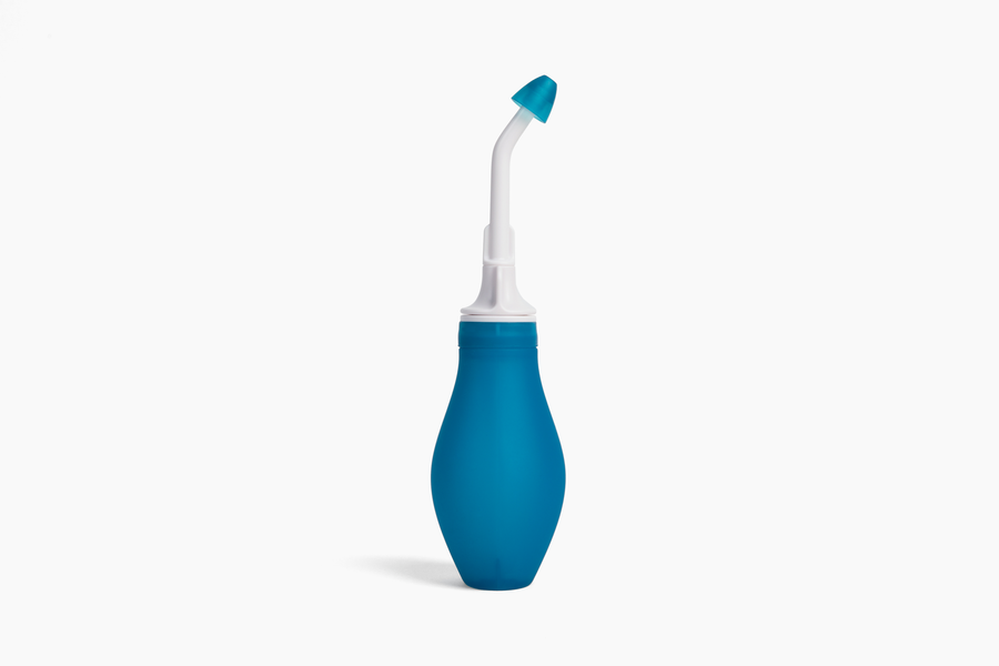 RhinoRinser blue silicone sinus rinse bottle with tip attached